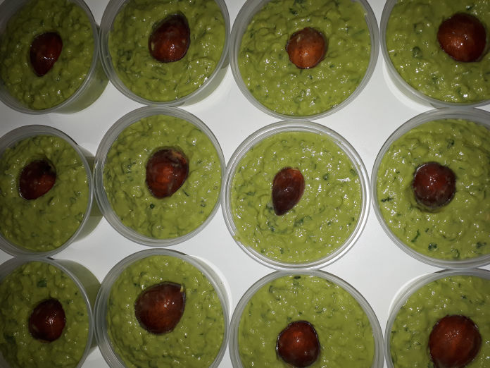 Guacamole Dip with avocado seed for show.